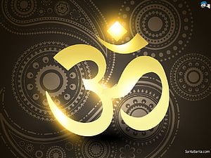 Golden Om Symbol with Mandala Patterns on Dark Background HD wallpaper