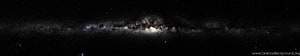 Milky Way Galaxy Core Spanning a Wide Panoramic Night Sky with Dense Star Fields and Nebulae HD wallpaper