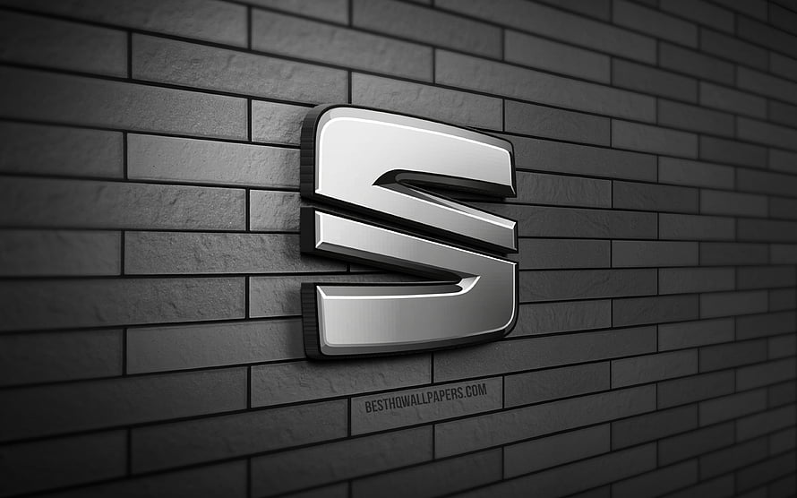 Seat Automotive Emblem Mounted on Dark Gray Brick Wall HD wallpaper