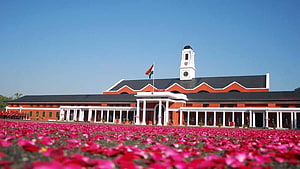 Indian Military Academy Dehradun with Rose Petal Carpet and National Flag HD wallpaper