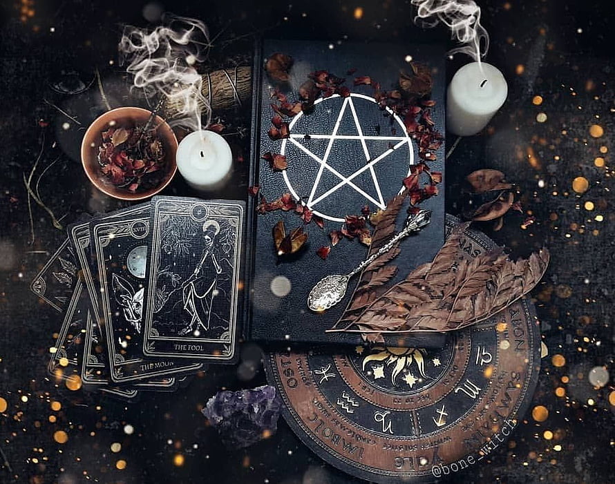 Dark Witchcraft Aesthetic Flat Lay with Tarot Cards, Pentagram Book, and Candles HD wallpaper