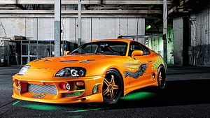Orange Modified Toyota Supra MK4 with Custom Widebody Kit and Racing Graphics HD wallpaper