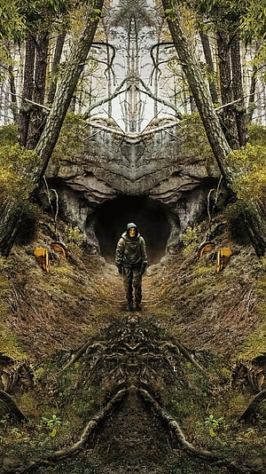Dark Netflix Series Forest Cave Entrance With Hooded Figure And Latin Inscriptions HD phone wallpaper