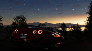 Nissan GT-R R35 Nismo at dusk overlooking a mountain lake with starry sky HD wallpaper