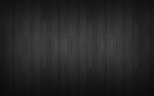 Dark Charcoal Wood Plank Texture with Subtle Grain and Minimalist Aesthetic HD wallpaper