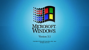 Microsoft Windows 3.1 Retro Boot Screen with Classic Four-Pane Logo on Blue Background HD wallpaper