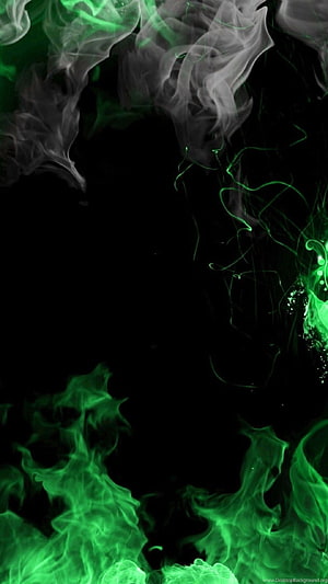 Vibrant Green Smoke Swirling Against a Deep Black Background HD phone wallpaper
