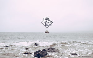 Minimalist Bible Verse Quote Over Misty Ocean Shoreline With Rocks HD wallpaper