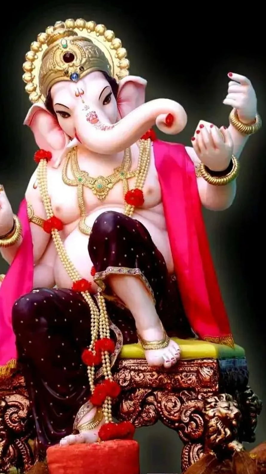 Ganesha Seated on Ornate Pedestal Wearing Gold Crown and Red Drape HD phone wallpaper