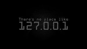 Dark Pixelated 127.0.0.1 Loopback Address on Black Background HD wallpaper