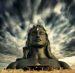 Adiyogi Shiva Statue Under Dramatic Stormy Sky HD wallpaper