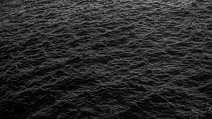 Dark Ocean Surface With Churning Black Waves And Deep Water Texture HD wallpaper