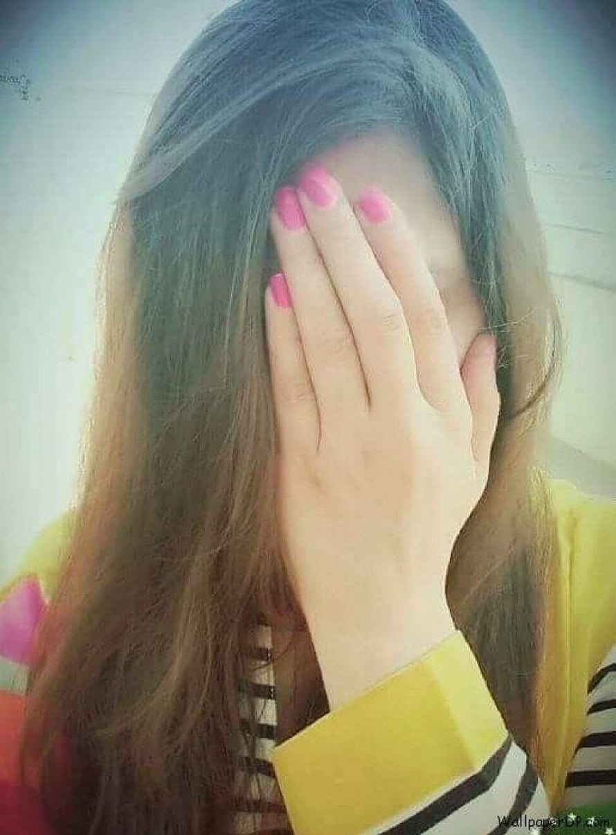 Girl with long brown hair covering her face with hand featuring bright pink nail polish HD phone wallpaper