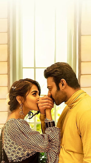 Radheshyam Movie Still Featuring Prabhas and Pooja Hegde in Romantic Embrace HD phone wallpaper