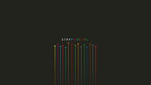 Minimalist Stay Positive Motivational Quote with Colorful Upward Arrows on Dark Background HD wallpaper