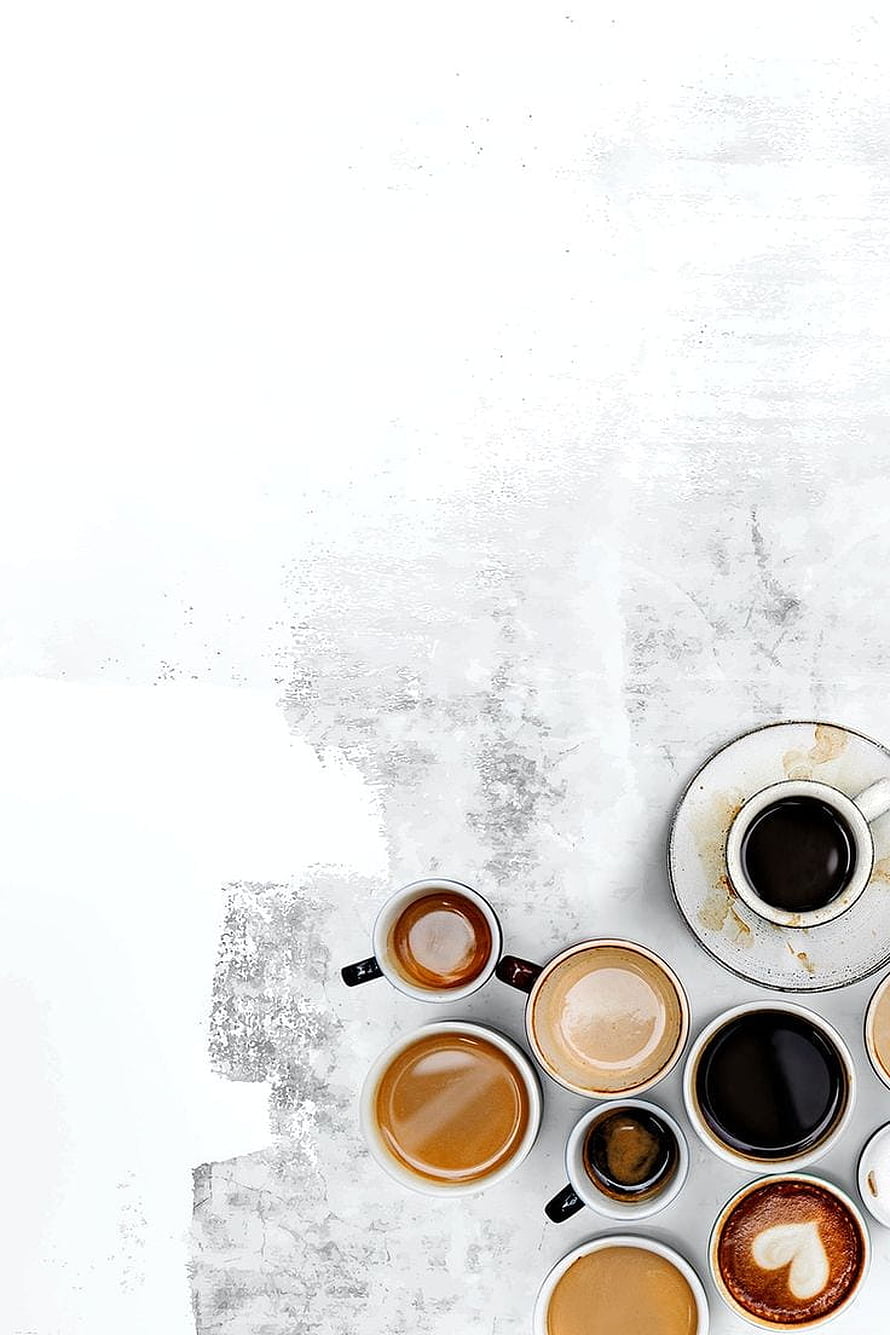 Assorted Coffee Cups and Espresso Mugs on Textured White Concrete Surface HD phone wallpaper