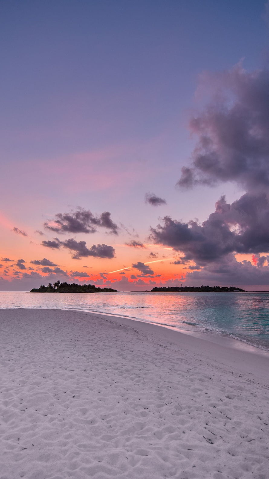 Tropical Island Beach at Sunset with Vibrant Orange Sky and White Sand HD phone wallpaper