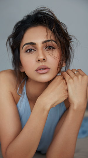 Rakul Preet Singh Portrait in Soft Blue Top with Messy Hair HD phone wallpaper