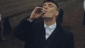 Cillian Murphy as Tommy Shelby Smoking a Cigarette in Peaky Blinders HD wallpaper