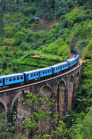 Blue Train Crossing the Nine Arch Bridge in the Lush Highlands of Sri Lanka HD phone wallpaper