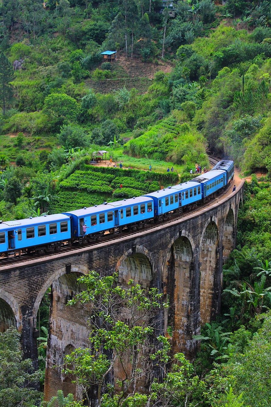 Blue Train Crossing the Nine Arch Bridge in the Lush Highlands of Sri Lanka HD phone wallpaper