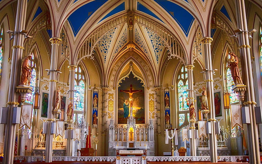 Gothic Cathedral Interior with Stained Glass Windows and Ornate Altar HD wallpaper