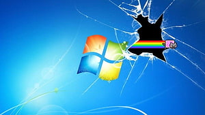 Windows 7 Desktop with Nyan Cat Shattering the Screen in a Cracked Glass Meme HD wallpaper