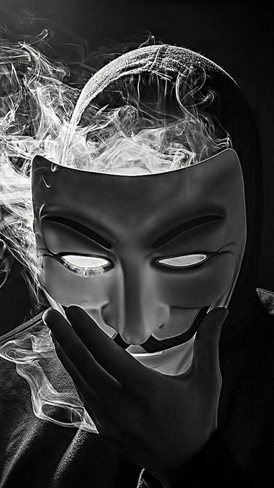 Black and White Guy Fawkes Mask Portrait with Dramatic Smoke and Hooded Figure HD phone wallpaper
