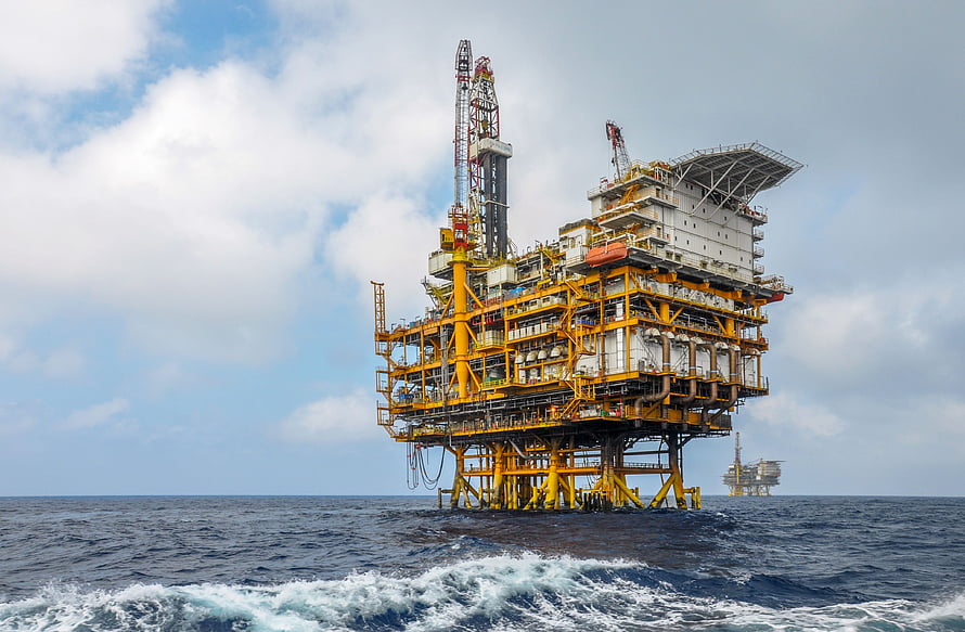 Offshore Oil Production Platform Standing in Deep Blue Ocean Waters HD wallpaper