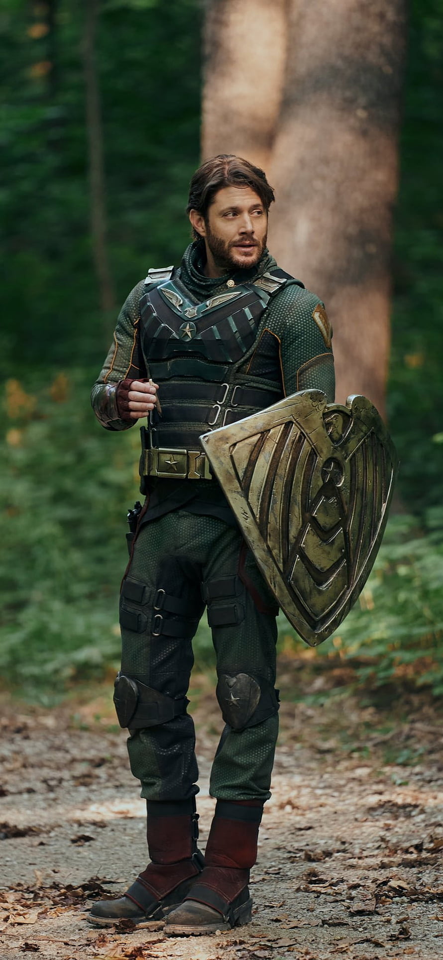 Soldier Boy in tactical armor and shield standing in a forest from The Boys HD phone wallpaper