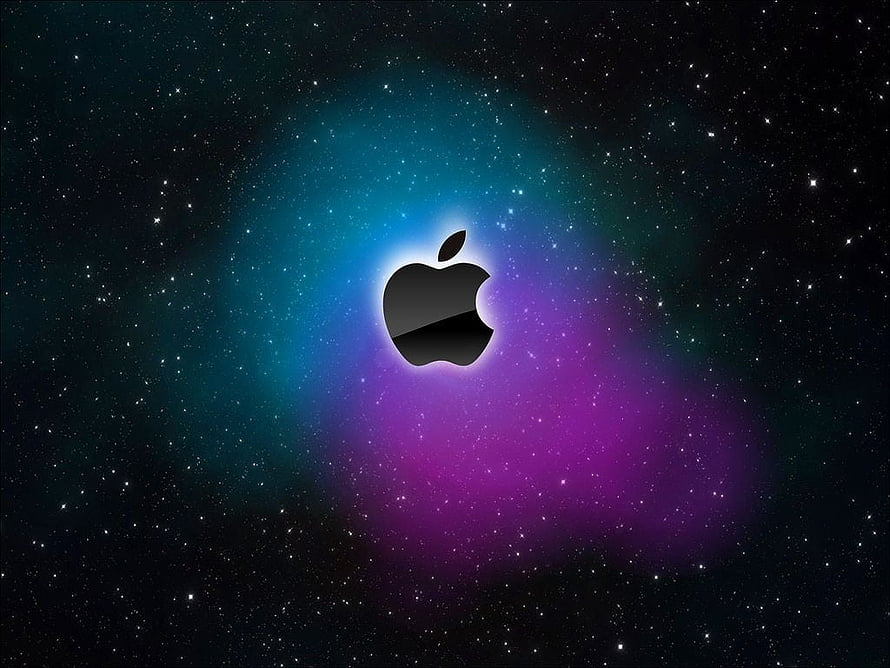 Apple Logo Centered in a Vibrant Cosmic Nebula with Starry Background HD wallpaper
