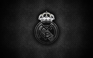 Real Madrid Club Crest in Monochrome on Textured Black Metal Surface HD wallpaper