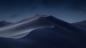 Dark Desert Dunes Under a Starry Night Sky with Distant Mountain Ranges HD wallpaper