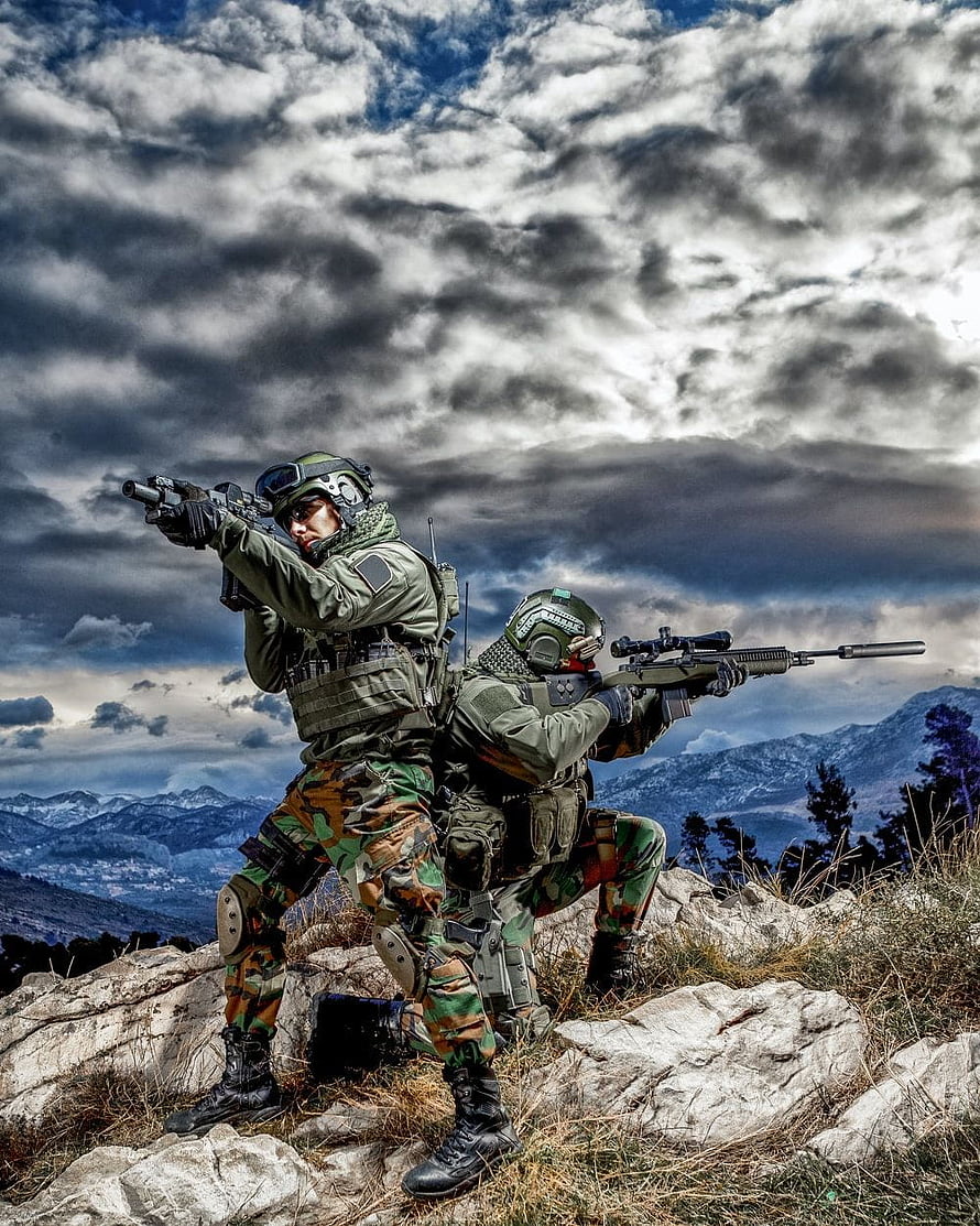 Two Special Forces Soldiers in Camouflage Taking Aim on a Rocky Mountain Ridge HD phone wallpaper
