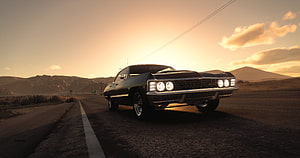 Black Chevrolet Impala on Desert Highway at Golden Hour HD wallpaper