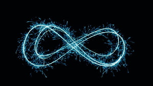 Glowing Blue Infinity Symbol with Electric Particles on Black Background HD wallpaper