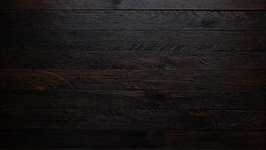Dark Charcoal Wood Plank Texture with Deep Grain Patterns and Rustic Surface Detail HD wallpaper