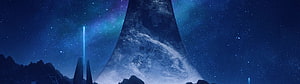 Halo Infinite alien monolith and spire under a starry night sky HD wallpaper