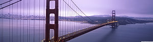 Golden Gate Bridge at Dusk with Purple Sky and City Lights HD wallpaper