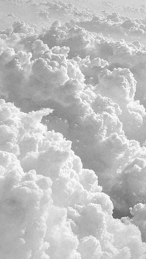 Monochrome Cumulus Clouds: A Serene Black and White Sky Texture HD phone wallpaper