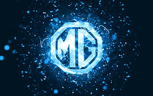 Glowing MG Octagonal Emblem with Electric Blue Particle Burst and Neon Energy Effects HD wallpaper