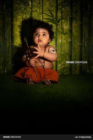 Baby Lord Murugan Portrait in Bamboo Forest with Traditional Attire HD phone wallpaper