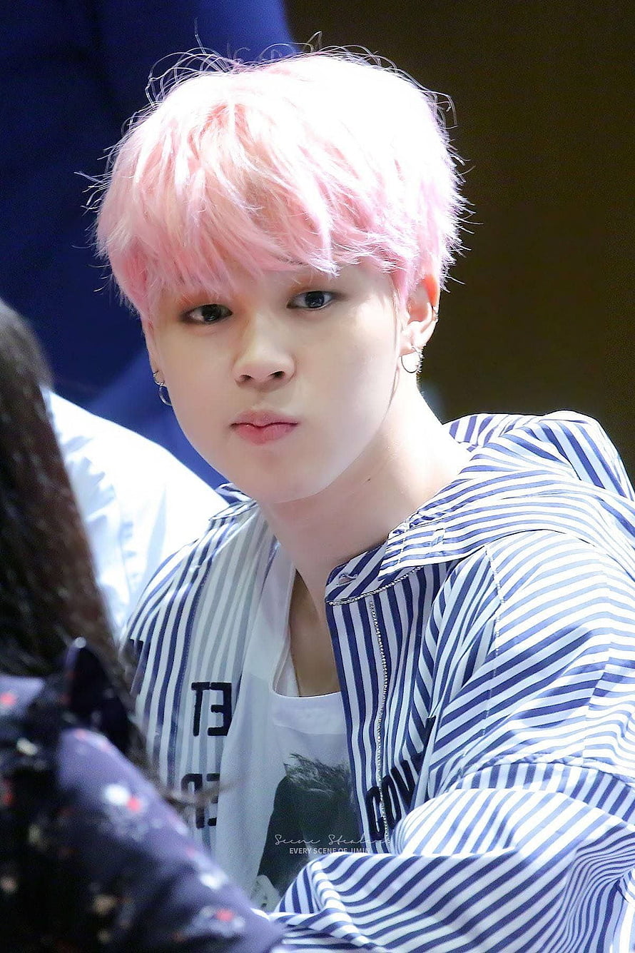 Jimin from BTS with pastel pink hair wearing a blue and white striped jacket HD phone wallpaper