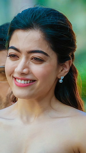 Rashmika Mandanna Smiling Portrait With Pearl Earrings And Dark Hair HD phone wallpaper