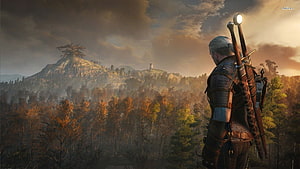 Geralt of Rivia overlooking a misty forest and mountain at sunset in The Witcher 3 HD wallpaper
