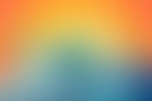 Warm Sunset to Cool Ocean Gradient with Soft Blurred Color Transitions HD wallpaper