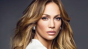 Jennifer Lopez Studio Portrait with Wavy Hair and Diamond Earrings HD wallpaper