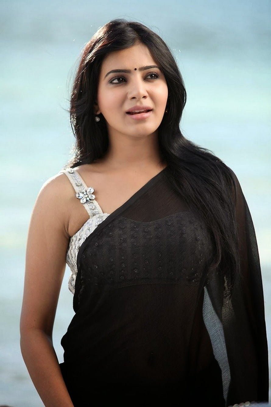 Samantha in a black sheer saree with white embellished blouse against a soft blue background HD phone wallpaper