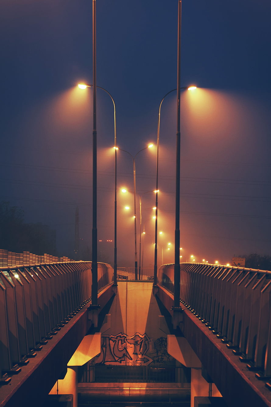 Foggy Night Bridge With Glowing Streetlights And Urban Graffiti HD phone wallpaper