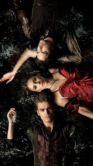 The Vampire Diaries promotional still featuring three characters submerged in dark water HD phone wallpaper